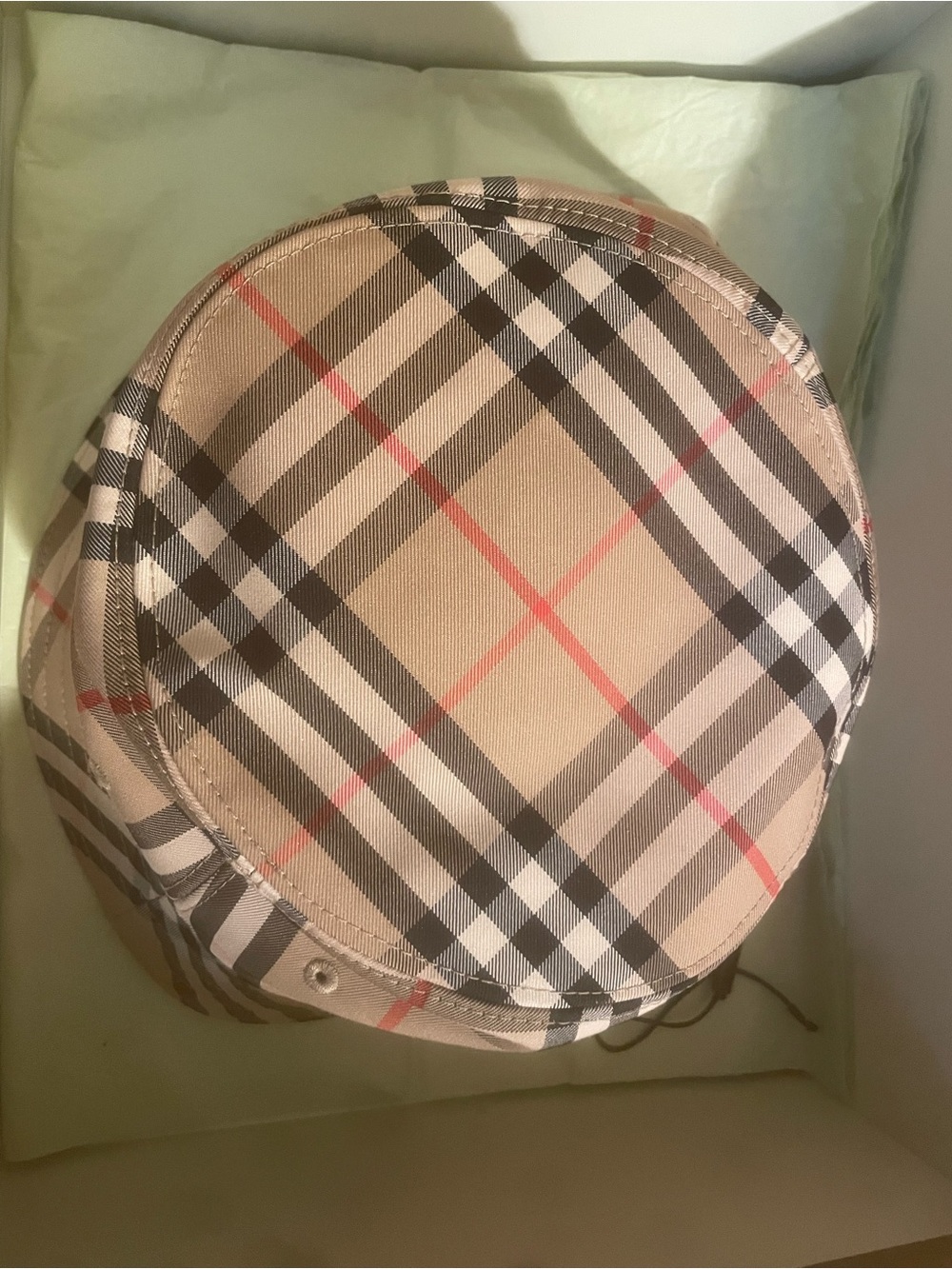 Burberry Tan Plaid Bucket Hat with Black and Red Accents